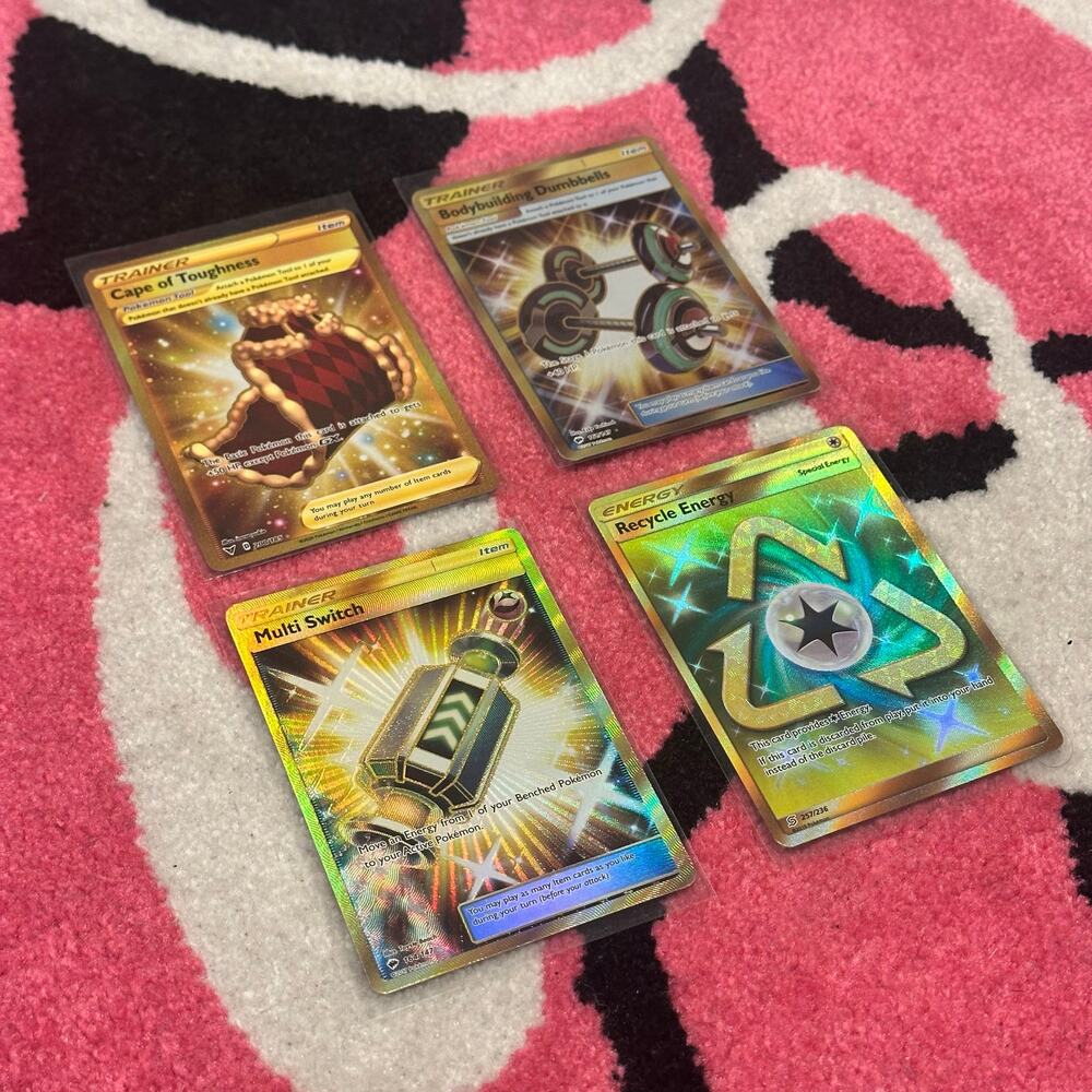 Pokémon Trainer Bundle – Dumbbells, Cape, Energy, Switch (SM Sets, Gold)